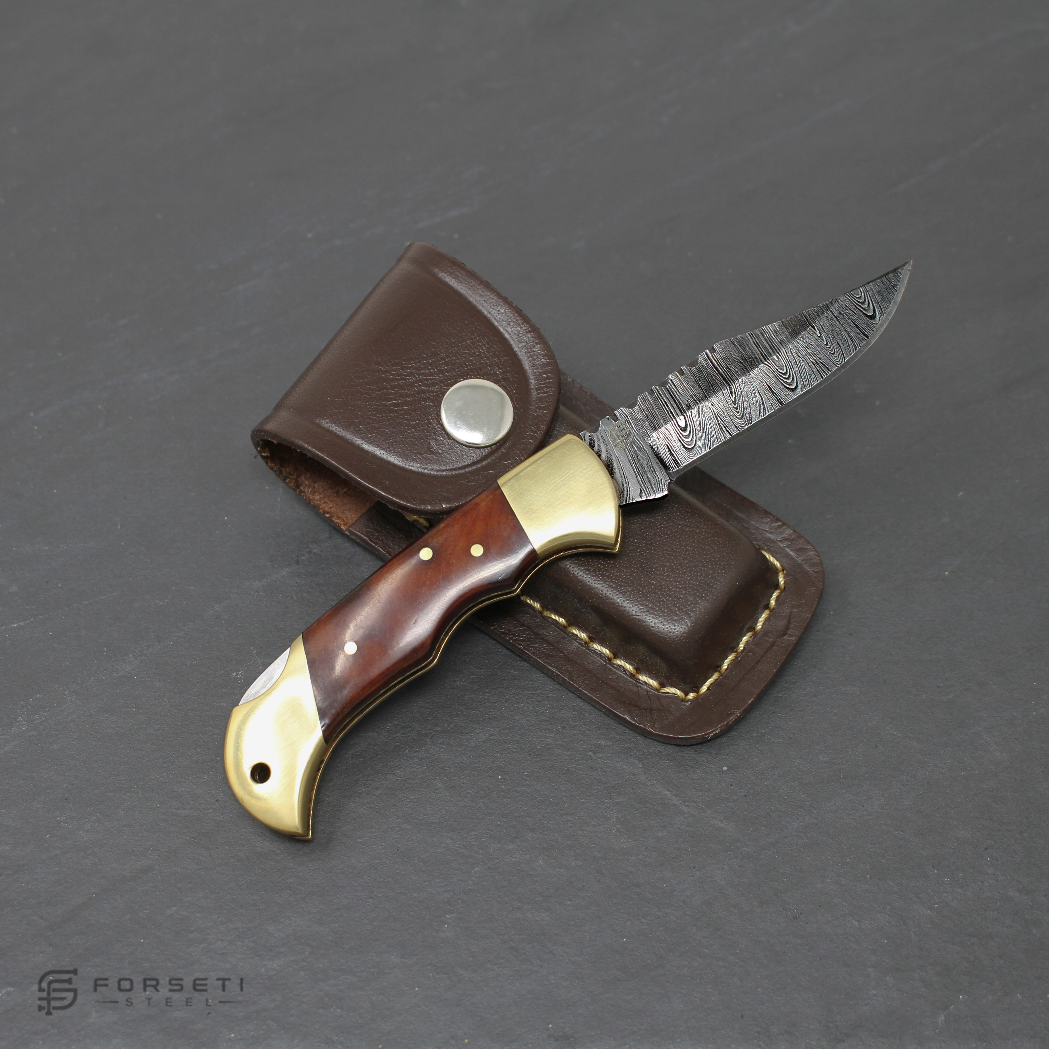 Hemingway Hand-Forged Damascus Steel Folding Knife - Stained Bone and Brass