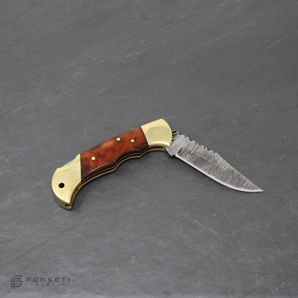 Hemingway Hand-Forged Damascus Steel Folding Knife - Stained Bone and Brass