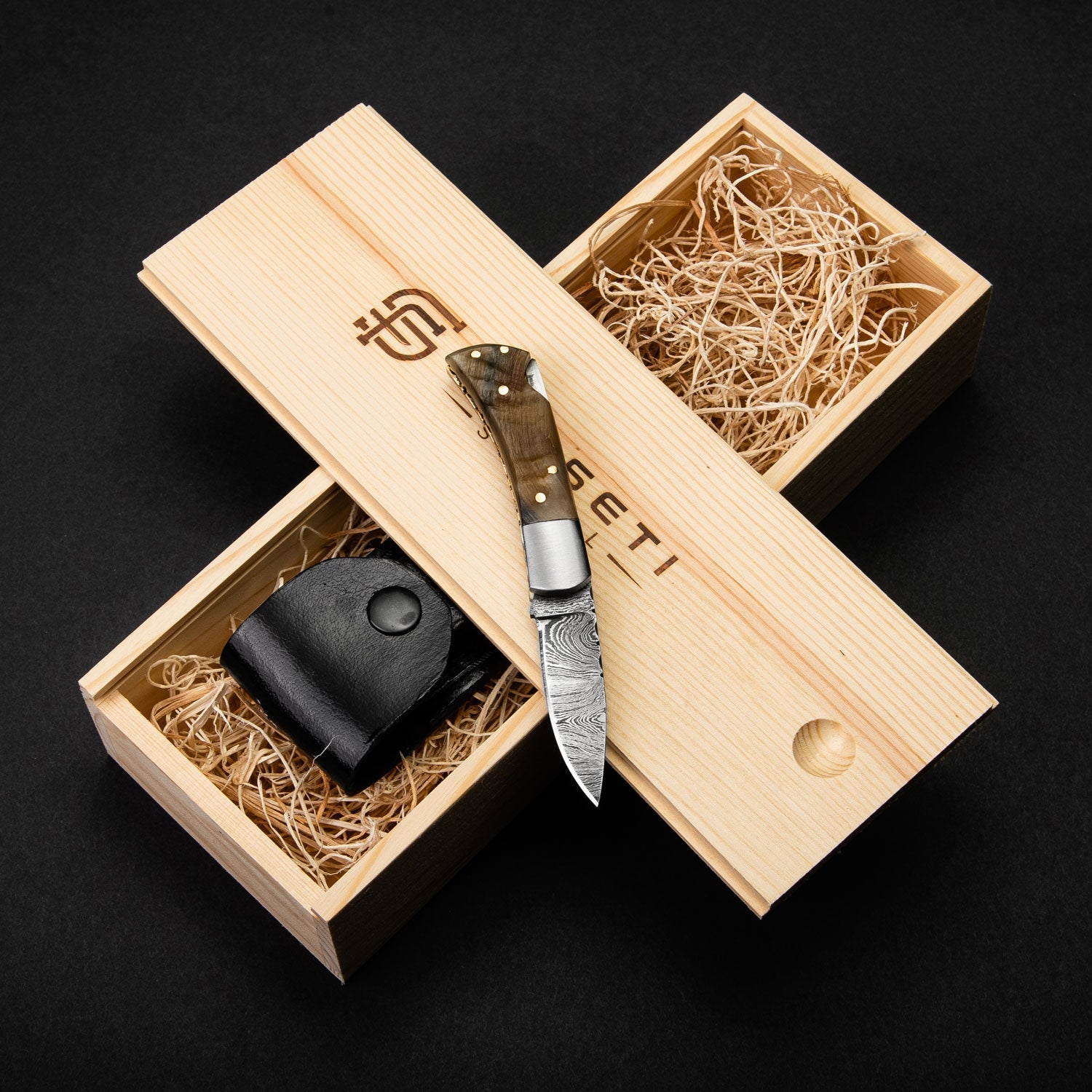 Confidant Hand-Forged Damascus Steel Folding Knife - Horn