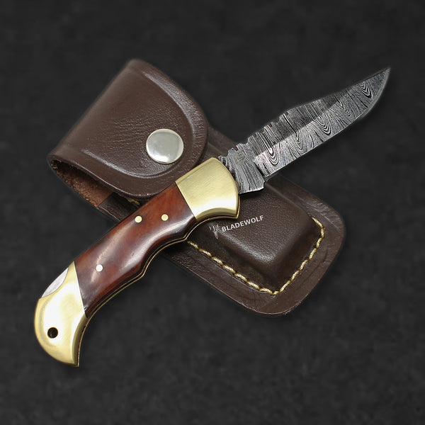 Hemingway Hand-Forged Damascus Steel Folding Knife - Stained Bone and Brass - BladeWolf A2Z image 1