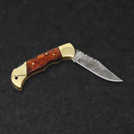 Hemingway Hand-Forged Damascus Steel Folding Knife - Stained Bone and Brass - BladeWolf A2Z image 2